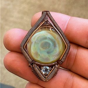 Heady wire-wrapped pendant with glass coin and Aquamarine gemstone.